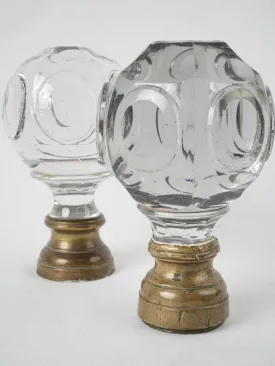 Antique French inexact pair of round clear glass 'Boule d'escalier’ newel caps w/ brass bases 7"